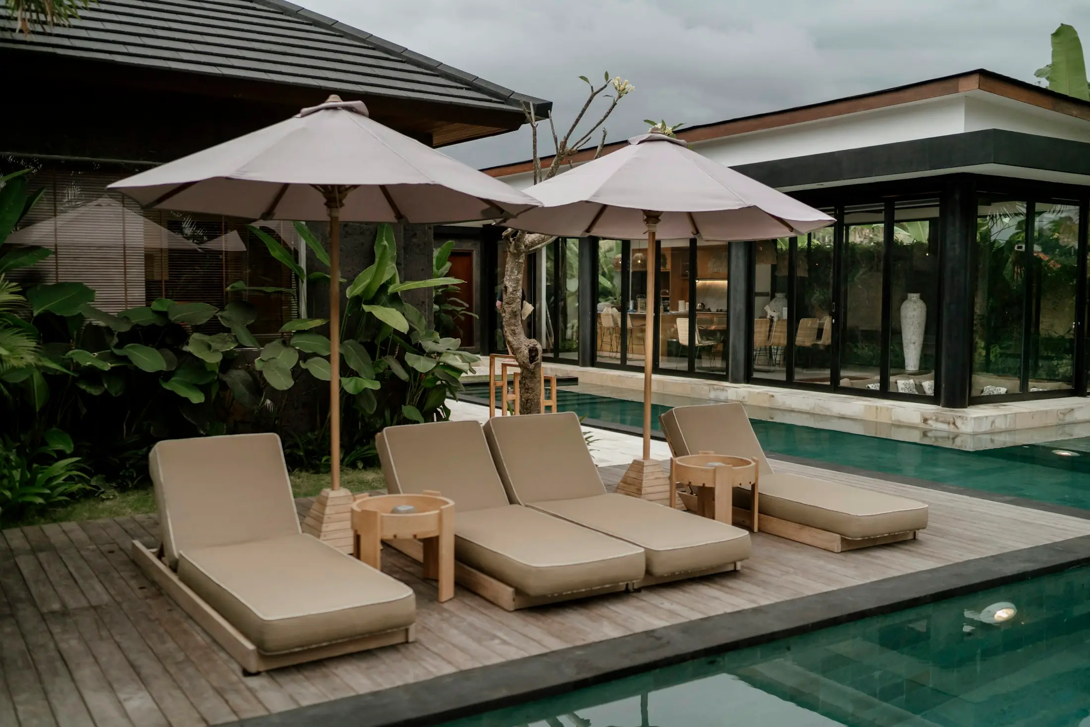 Private villa pool with sun loungers for a honeymoon escape
