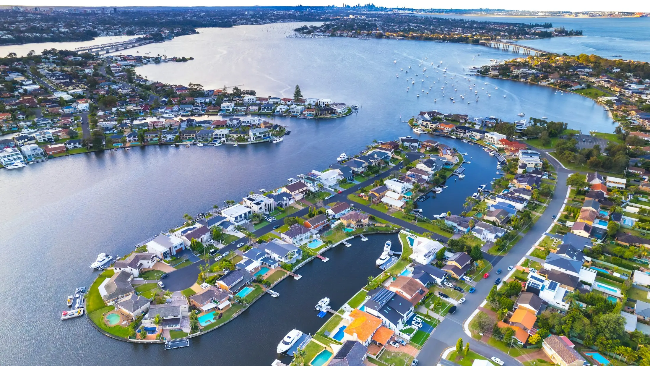 Aerial view of canal-front homes and waterways