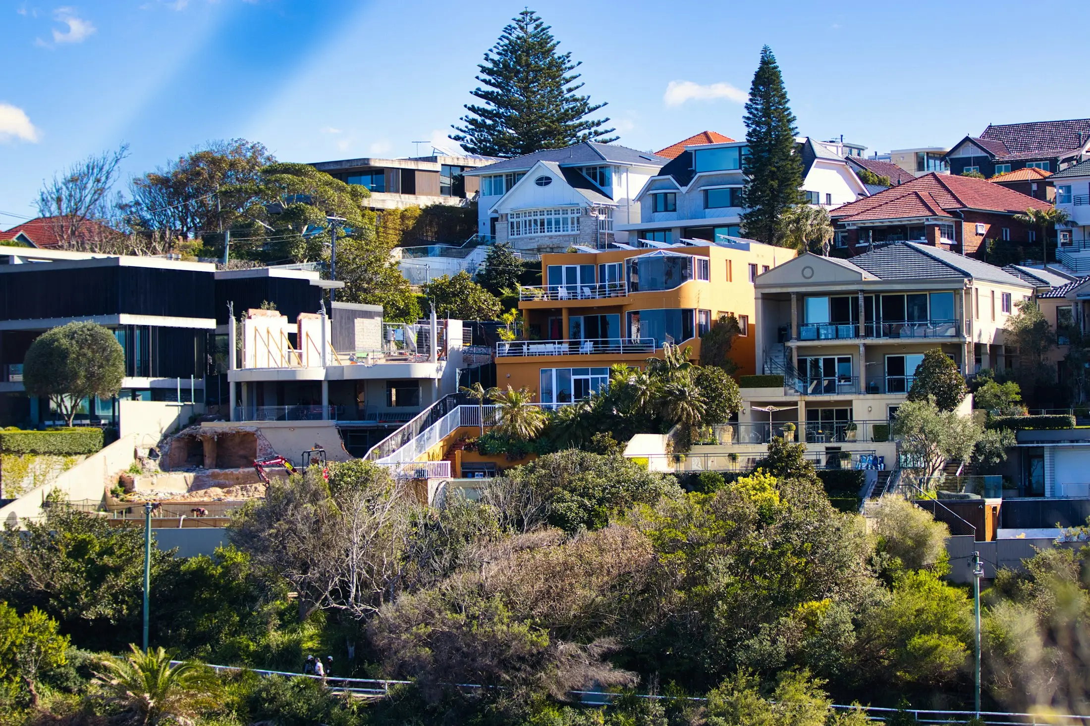 Hillside homes overlooking the coast in the sunshine